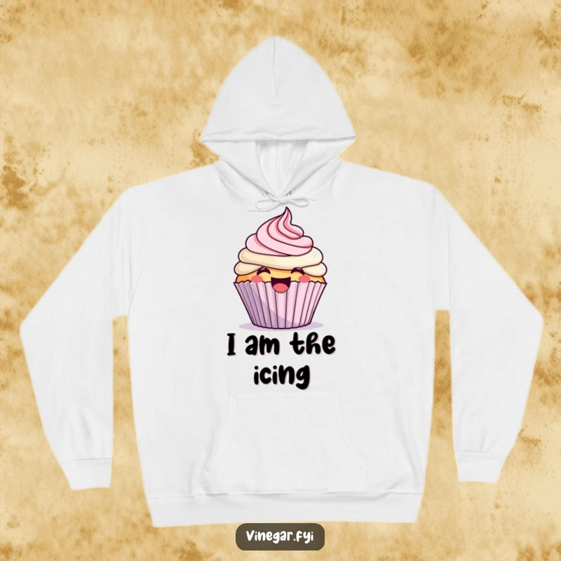 Funny kawaii cupcake excitedly frosting itself with a giggle, on a cozy, funny hoodie, perfect for comfort and warmth.