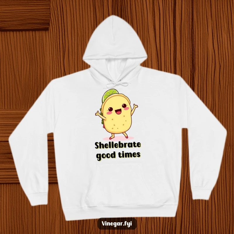 Funny kawaii taco doing a joyful jig with a lime slice hat, on a cozy, funny hoodie, perfect for staying warm.