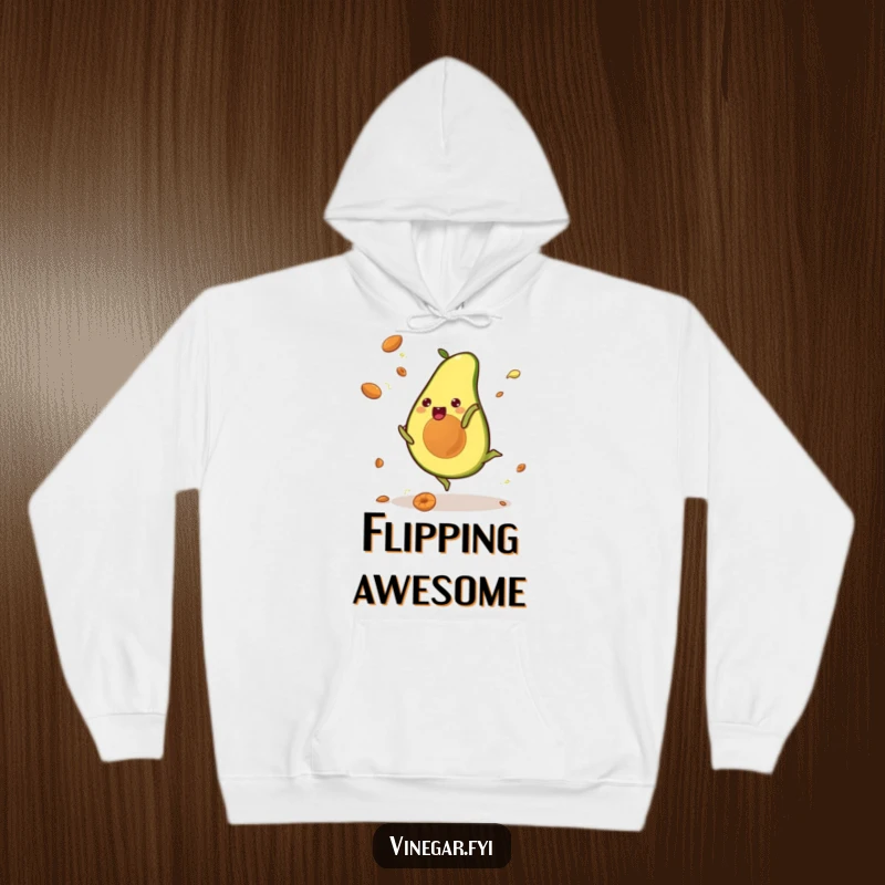 Funny hoodie with a kawaii avocado performing a cartwheel, pits flying, symbolizing lively energy and a hilarious, joyful scene.